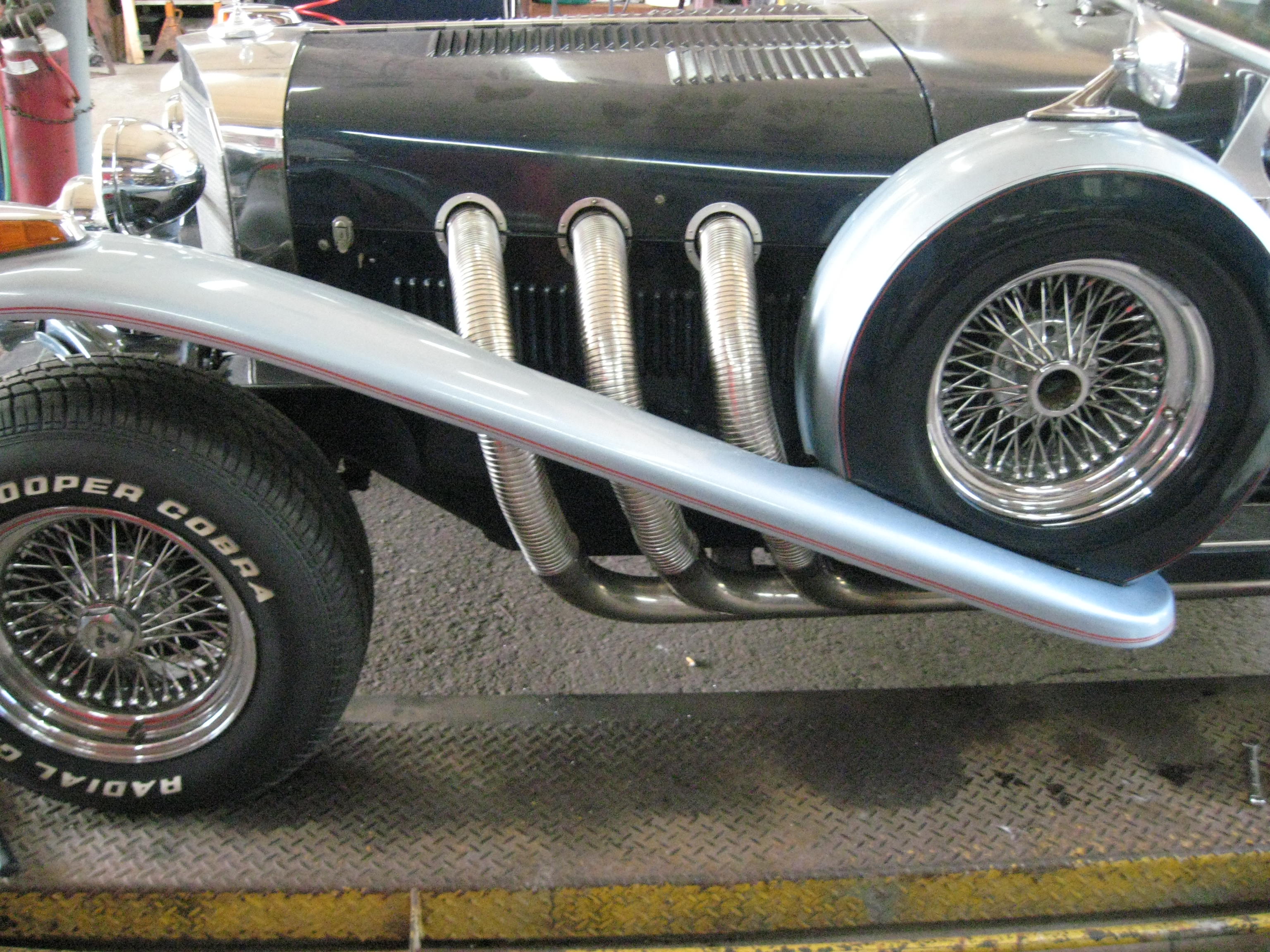 Automotive Exhaust Specialists work